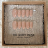 Blush Nude press-on nails - Short Almond